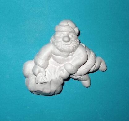 Santa s pytlem letící
